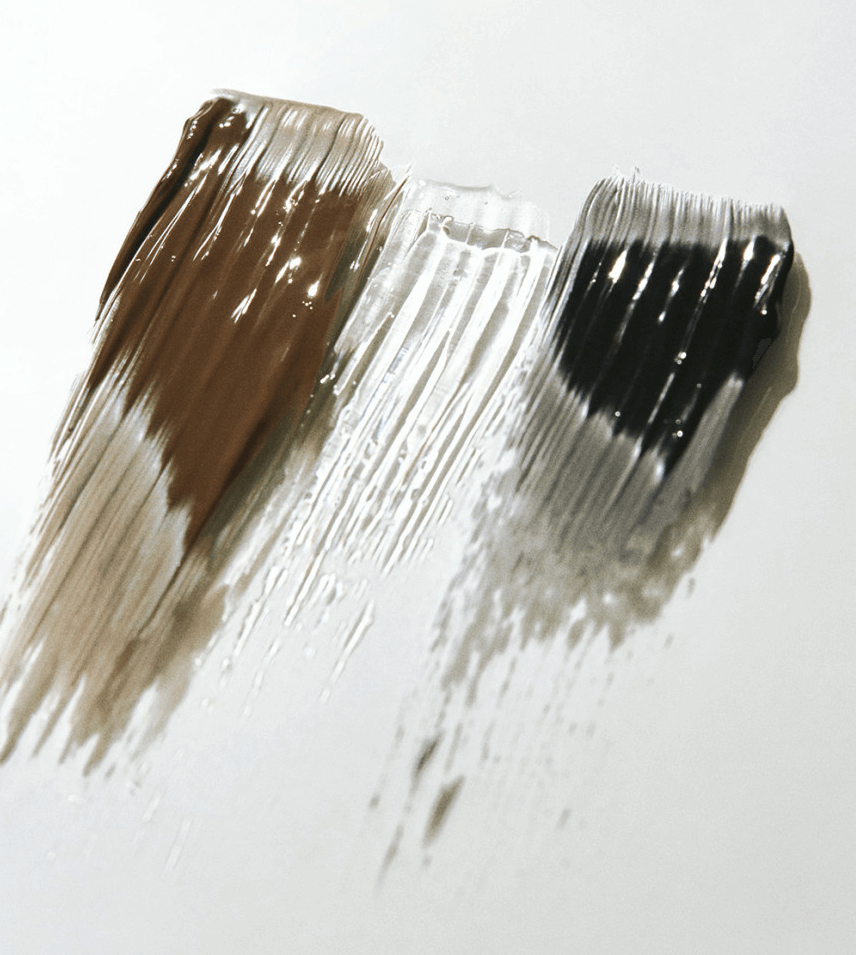 Swatches of Laka Wild Brow Shaper gel in brown, transparent, and black, showcasing versatile brow styling options.