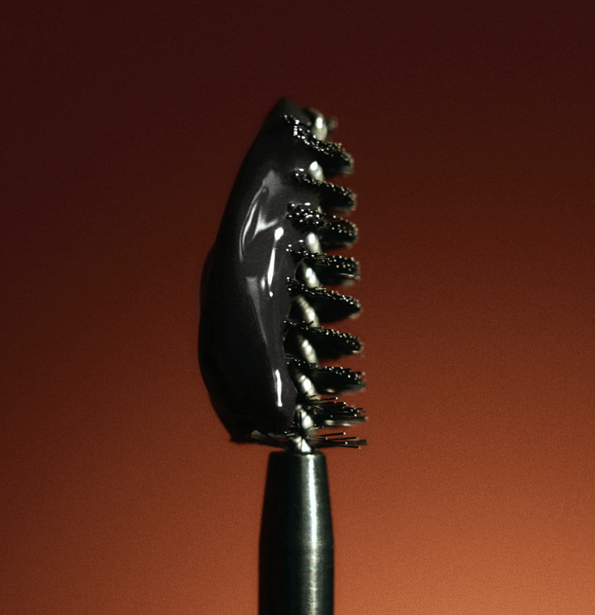 Close-up of Laka Wild Brow Shaper with black tint gel on a brush, ideal for defined, well-groomed brows.