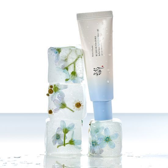 Beauty of Joseon Relief Sun Aqua Fresh Rice + B5 SPF50, 50ml, displayed with floral ice cubes for hydration.