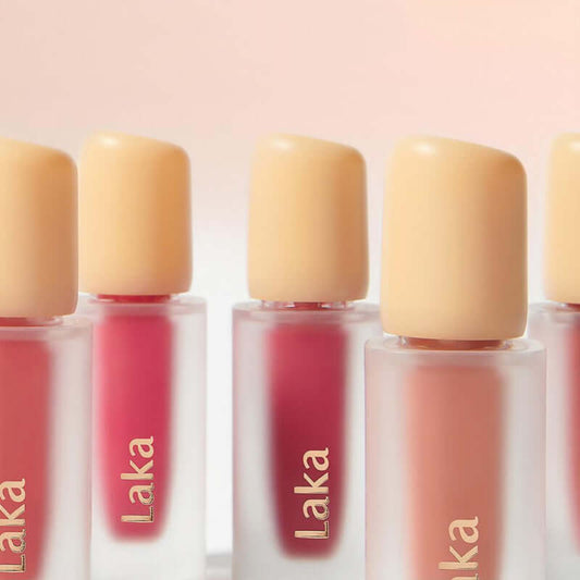 Laka Fruity Glam Tint lip tints in various shades with glossy finishes for a vibrant, juicy look.